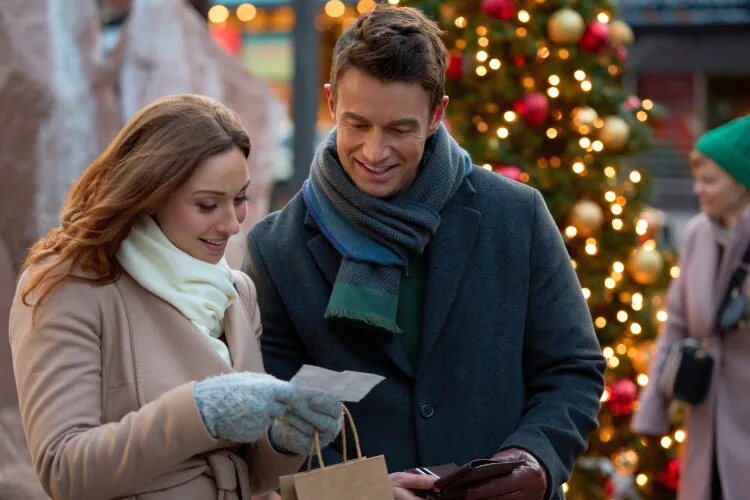 Robert Buckley and Amy Groening in a key scene from Twas the Date Before Christmas 2024