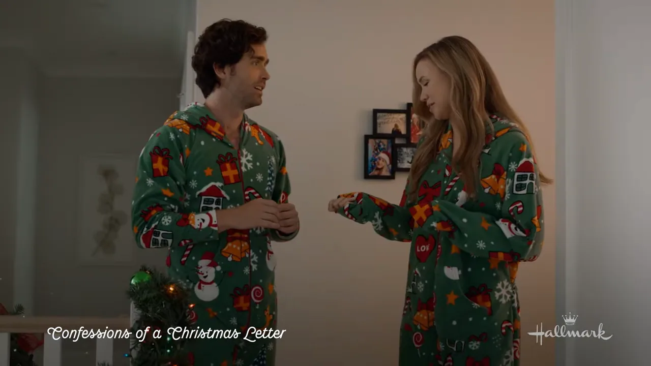 Angela Kinsey and Alec Santos in a scene from Confessions of a Christmas Letter